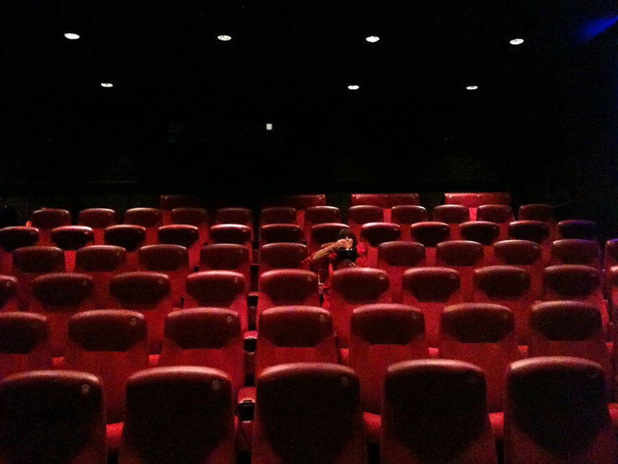 woman alone at movies