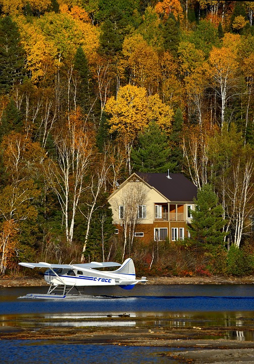 Autumn landscape and a sea plane