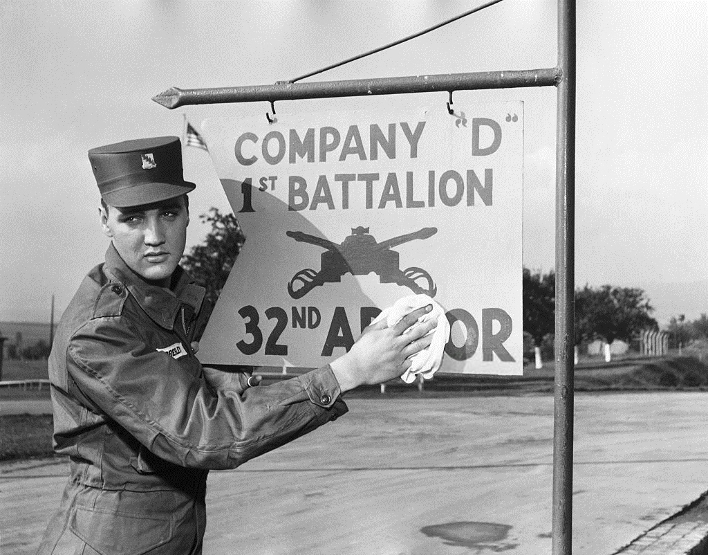 Elvis Presley poses for the camera during his military service at a US base in Germany.