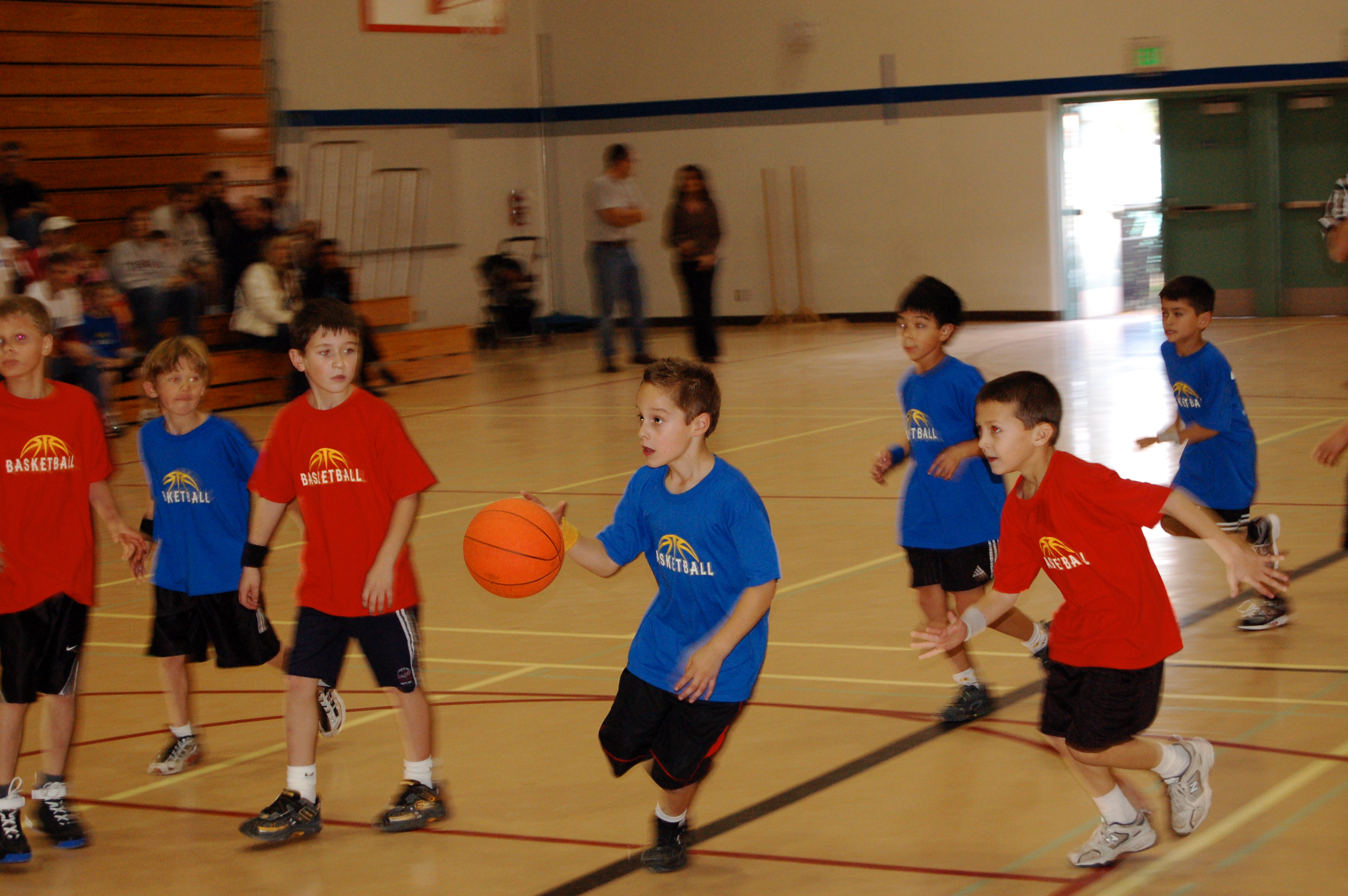 Kids playing basketball.