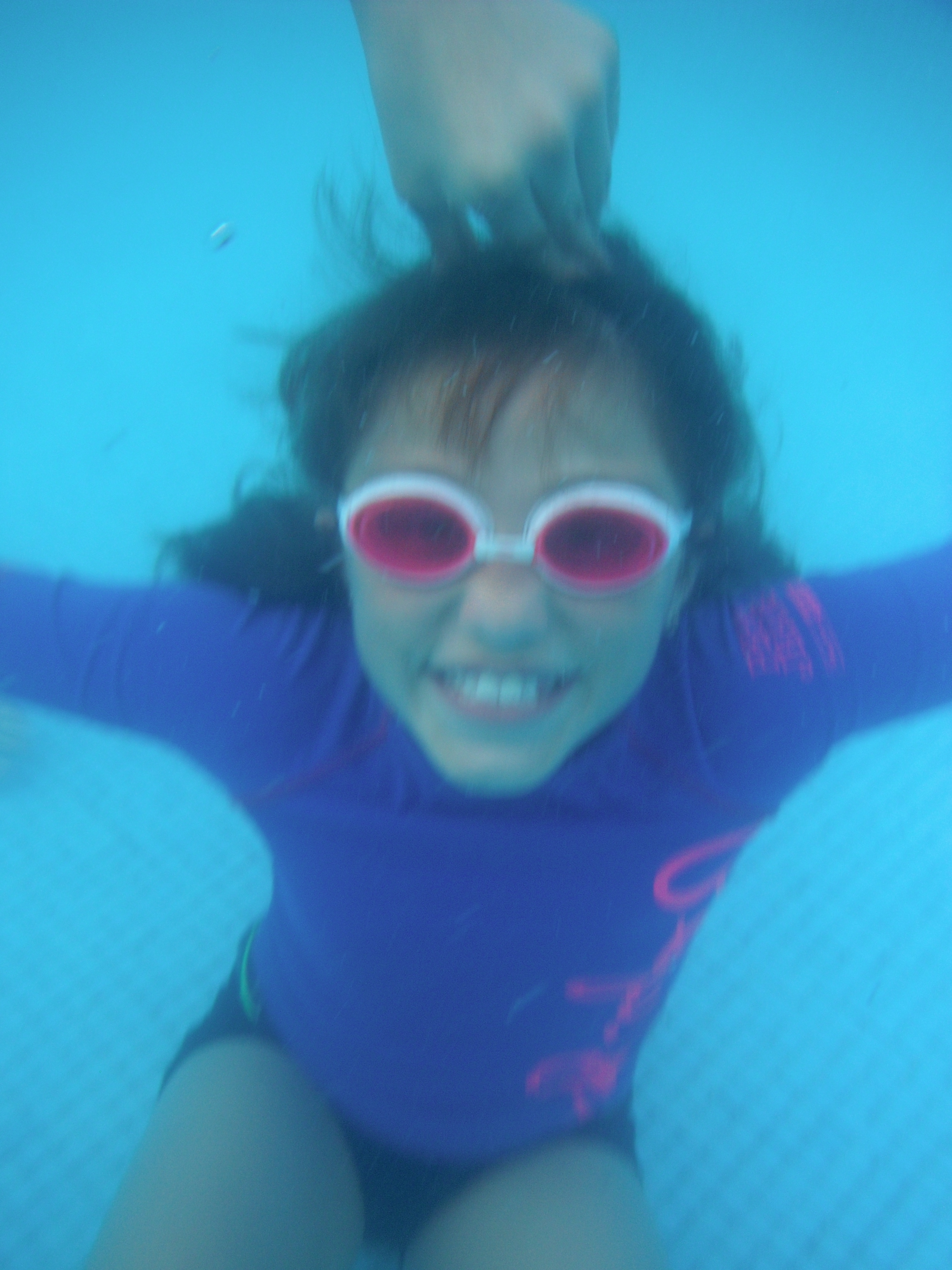 Happy swimming girl